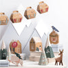 Advent calendar with wooden houses, cable cars and festive decorations on a snowy mountain background