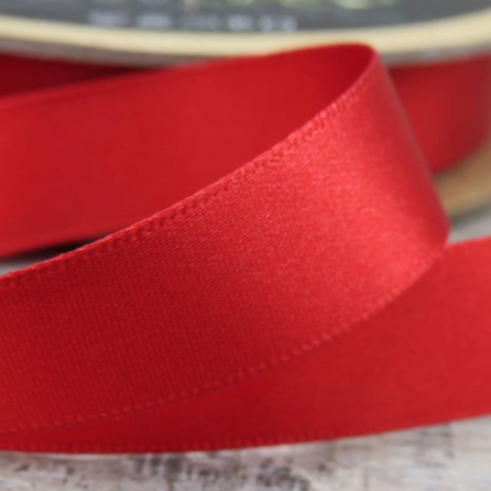 spool of red ribbon made 100% from recycled plastic bottles