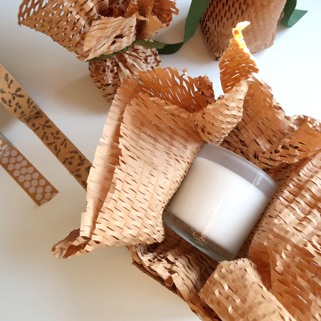 candle wrapped in honeycomb protective packaging