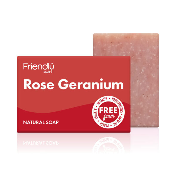 rose geranium soap bar standing next to its red box