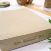 Underside of a grass paper mailing bag stating made from grass paper
