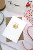 avo-cuddle valentine card with two halfs of an avocado cuddling